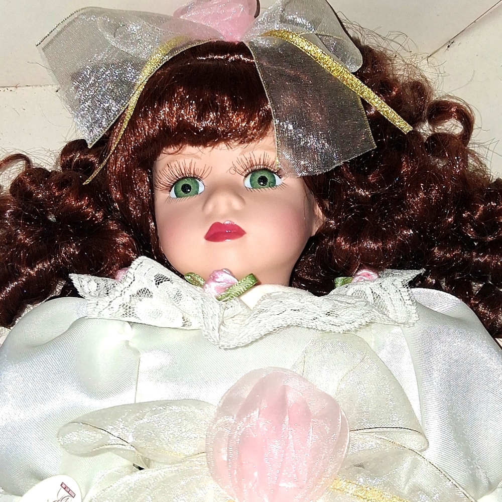 Porcelin Collectible Doll with Green Eyes and Brown Hair